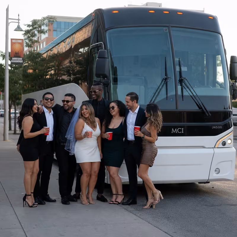 Passengers loading luggage while boarding an Albuquerque group shuttle